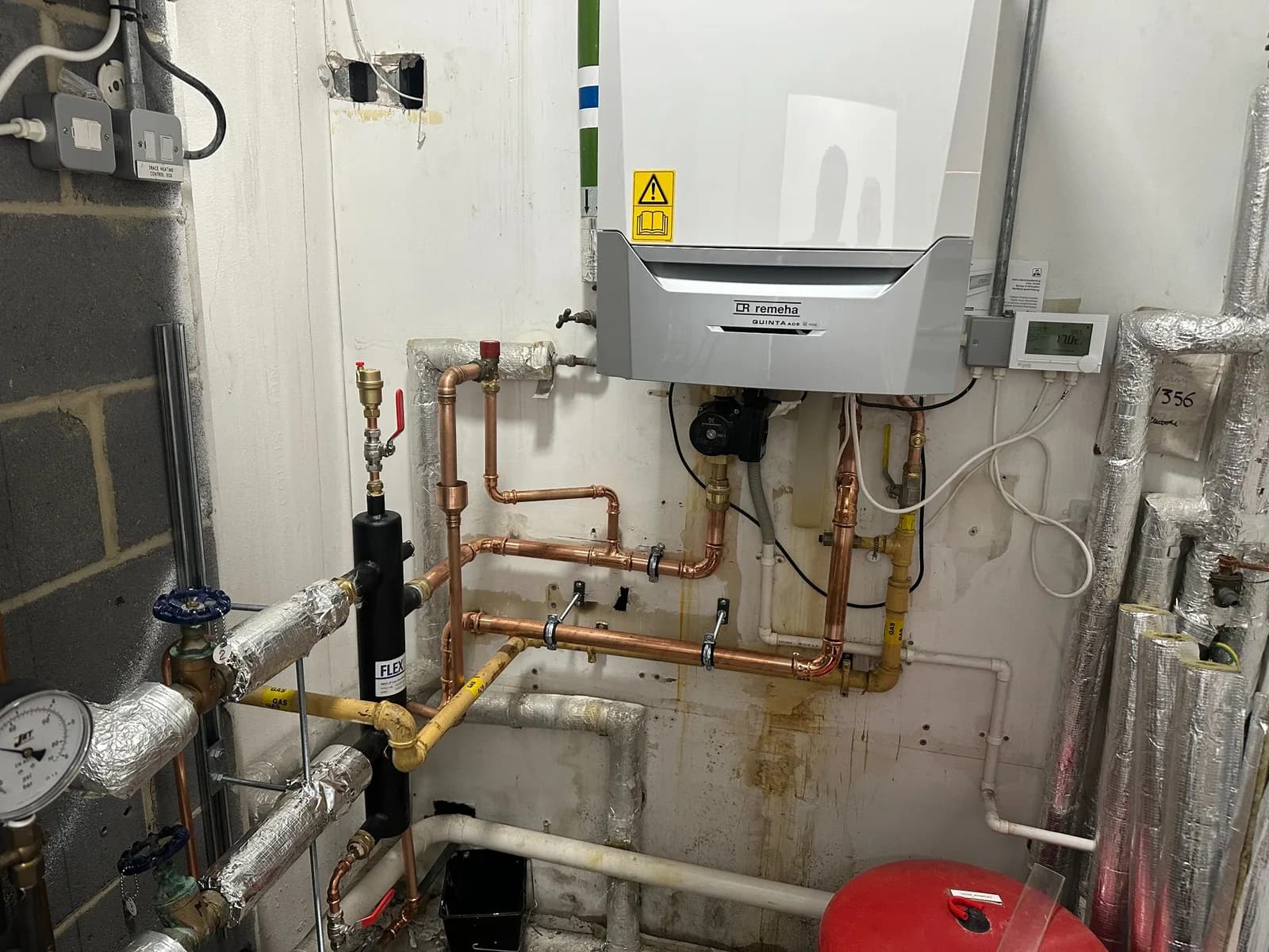 Commercial boiler replacement with low-loss header and copper pipework