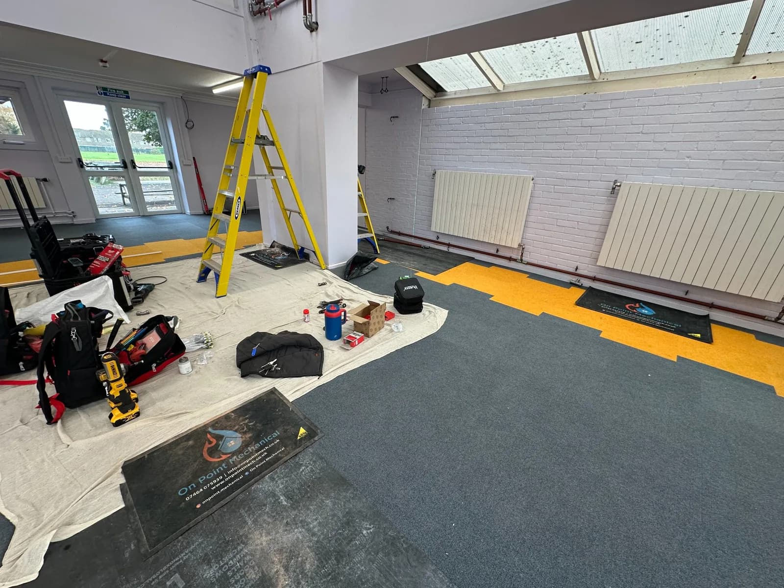 Heating pipework and radiator installation in an education building