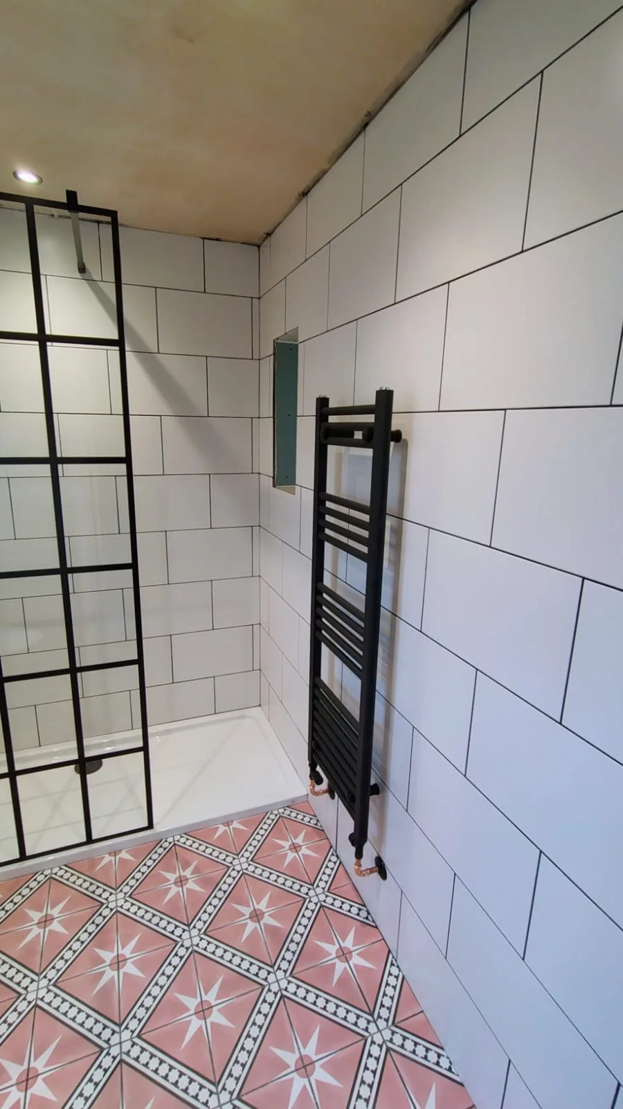 Patterned-floor shower-room installation, project photograph 2 of 4