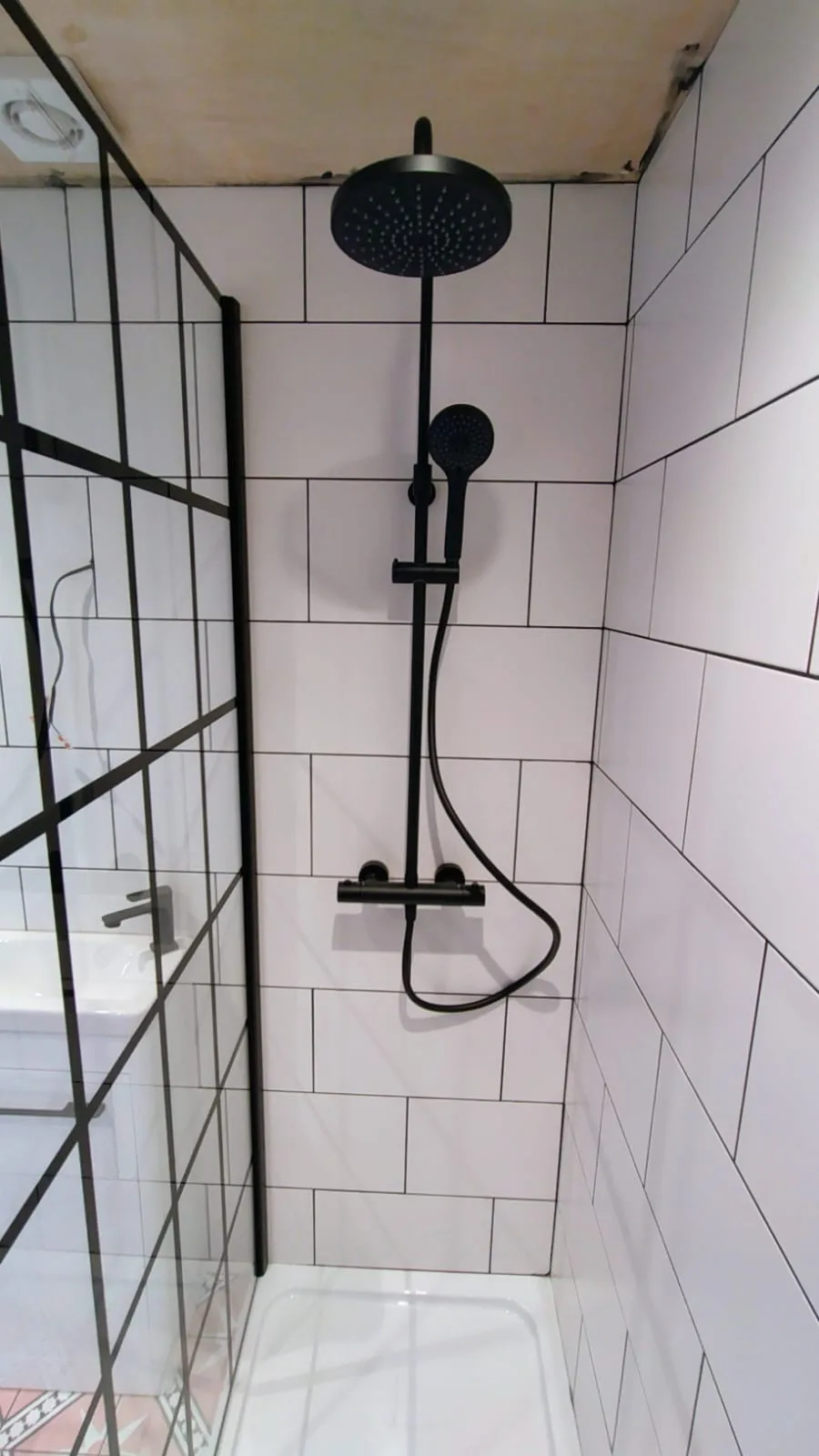 Patterned-floor shower-room installation, project photograph 3 of 4