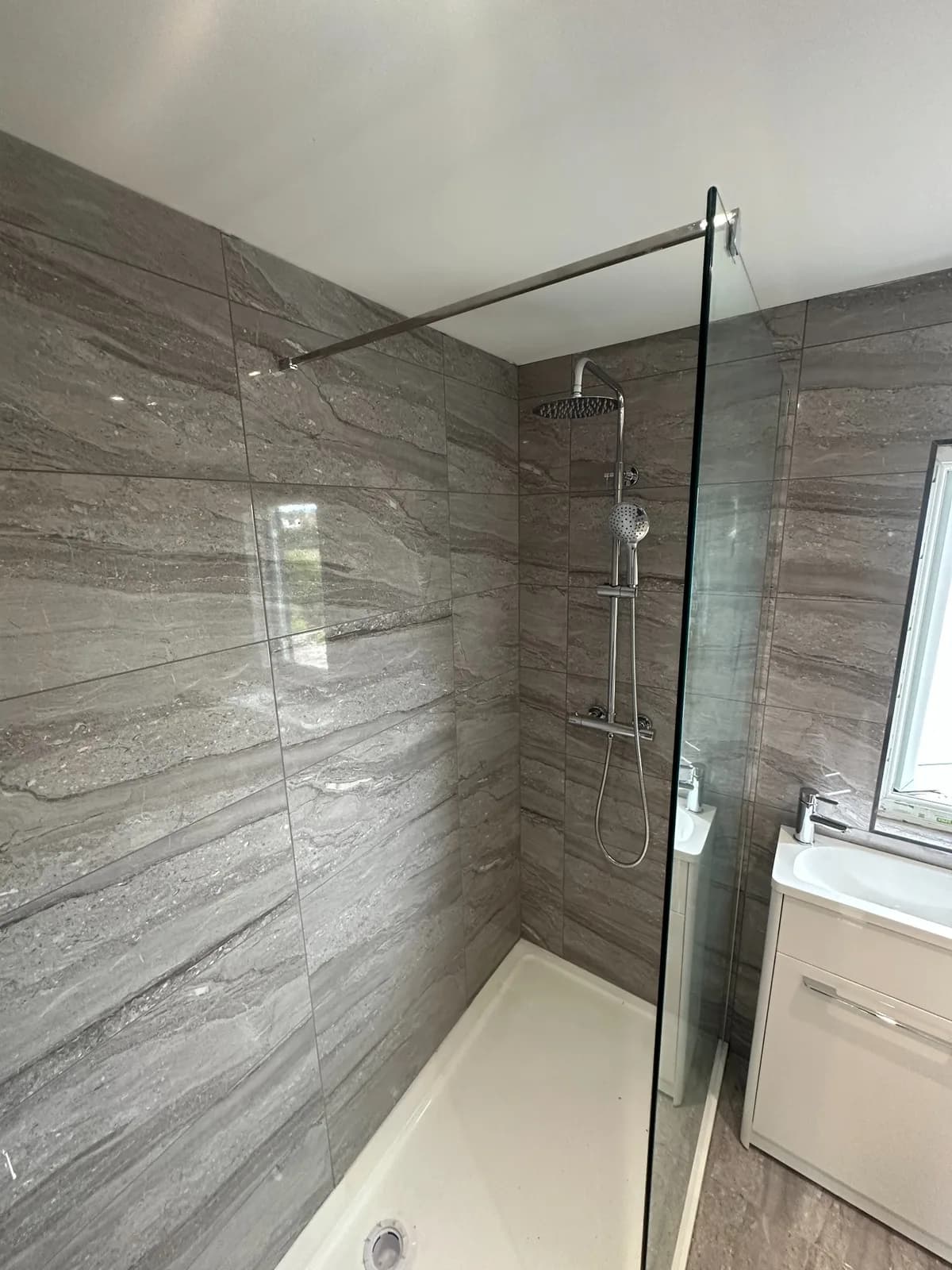 Marble-effect bathroom and shower installation, project photograph 2 of 4