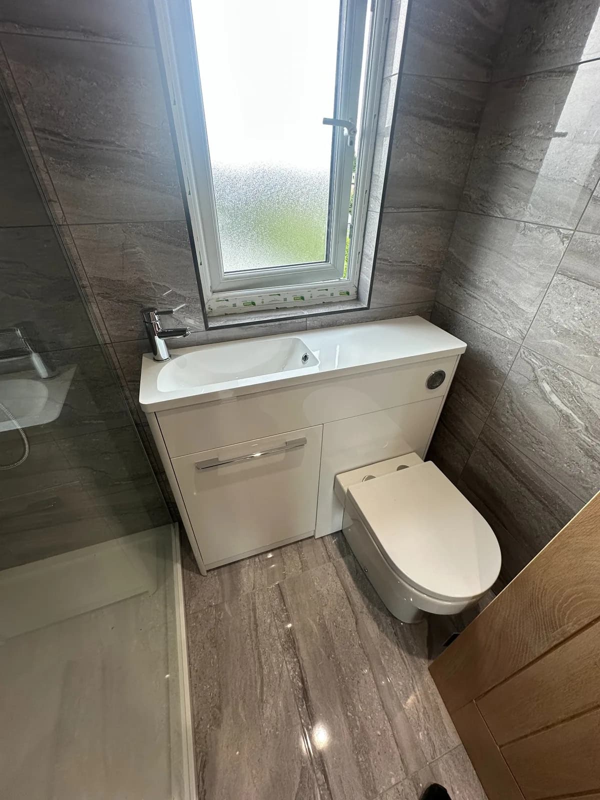Marble-effect bathroom and shower installation, project photograph 3 of 4